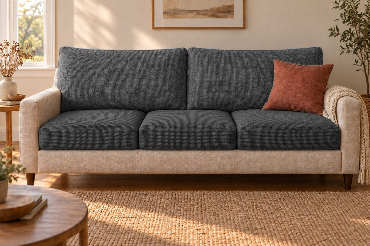 The complete five-piece set in dark grey on a three-seat sofa